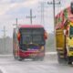 red and yellow truck on snow covered ground during daytime