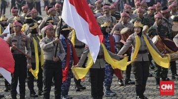 satpam-dan-ormas-ikut-terjun-upacara-dan-parade-hut-bhayangkara-di-monas