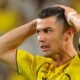Cristiano Ronaldo menyaksikan pertandingan uji coba pramusim antara Al Nassr melawan Almeria di Lisbon.